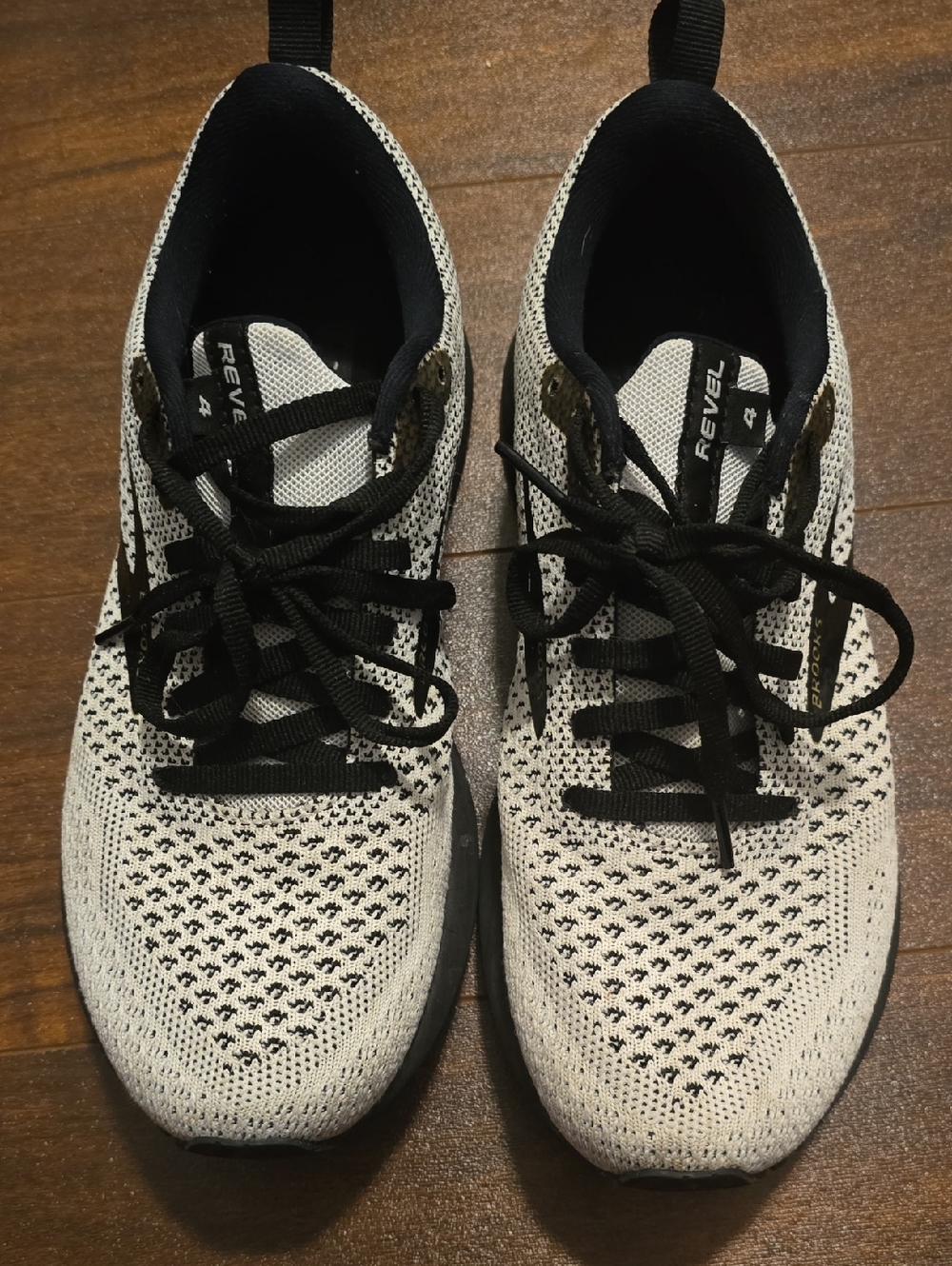REVEL 4 Running Sneakers in White and Black
